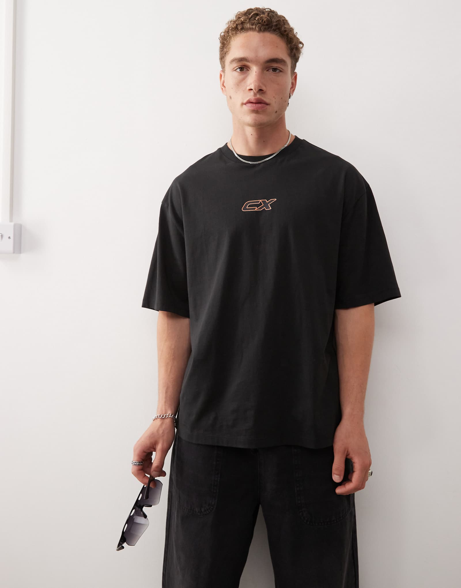 Футболка Collusion с принтом черного цвета 5190₽