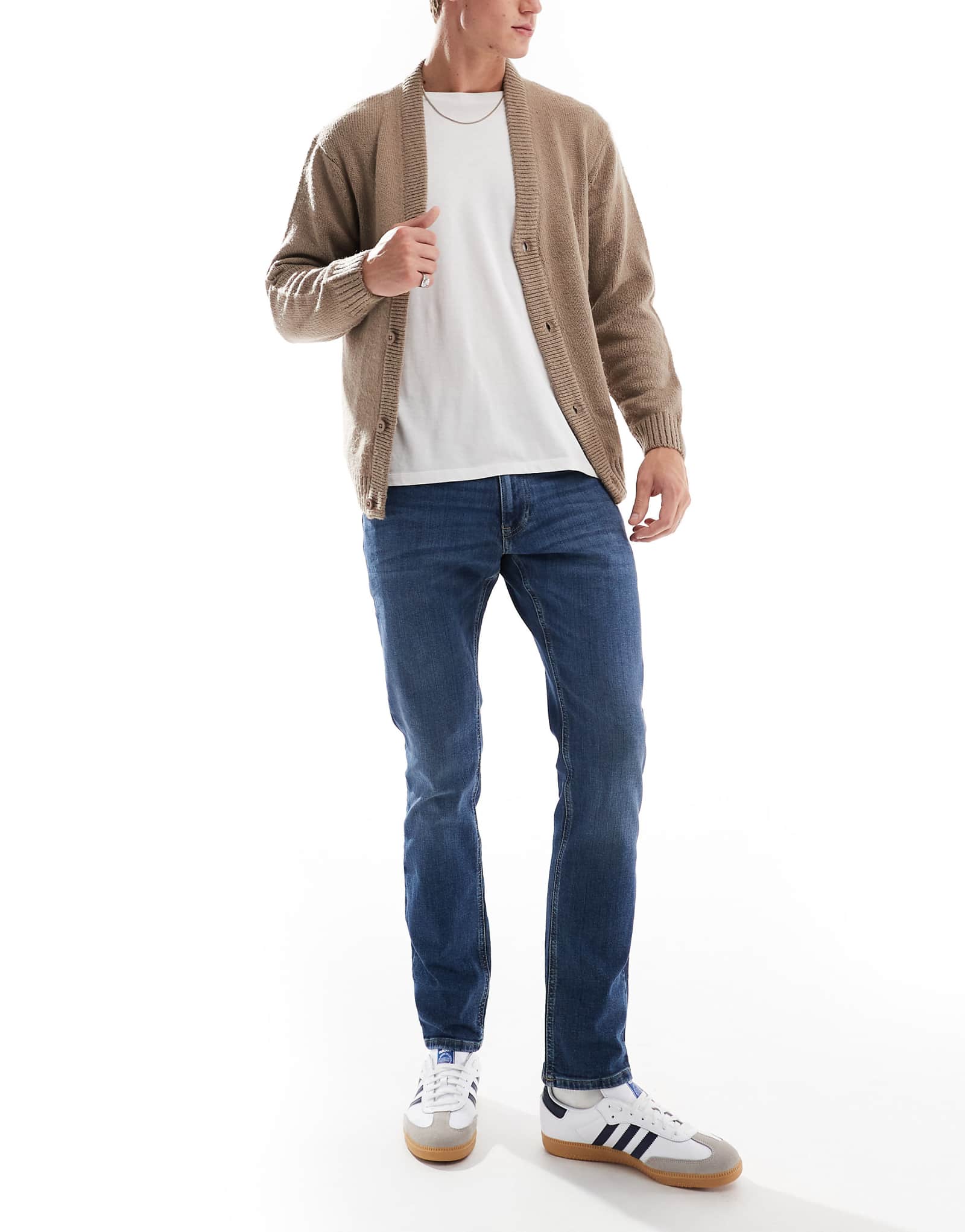 Узкие джинсы Tommy Jeans Scanton темного цвета выстиранные 19090₽