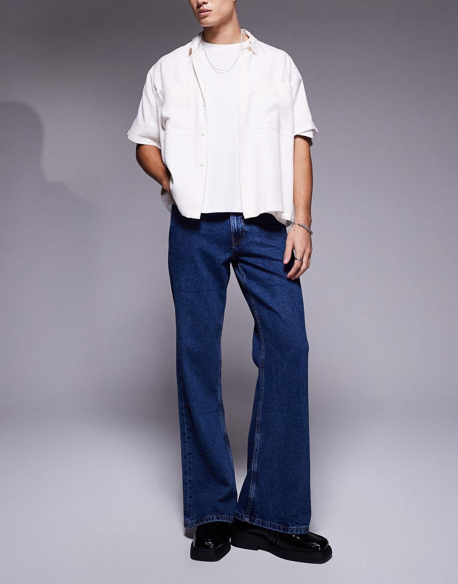 Винтажные джинсы-клеш ASOS DESIGN темно-синего цвета 5690₽