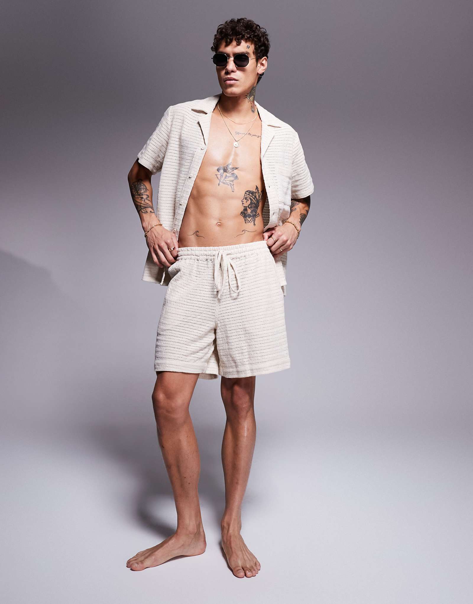 Пляжные шорты из текстурированного трикотажа South Beach кремового цвета 10590₽