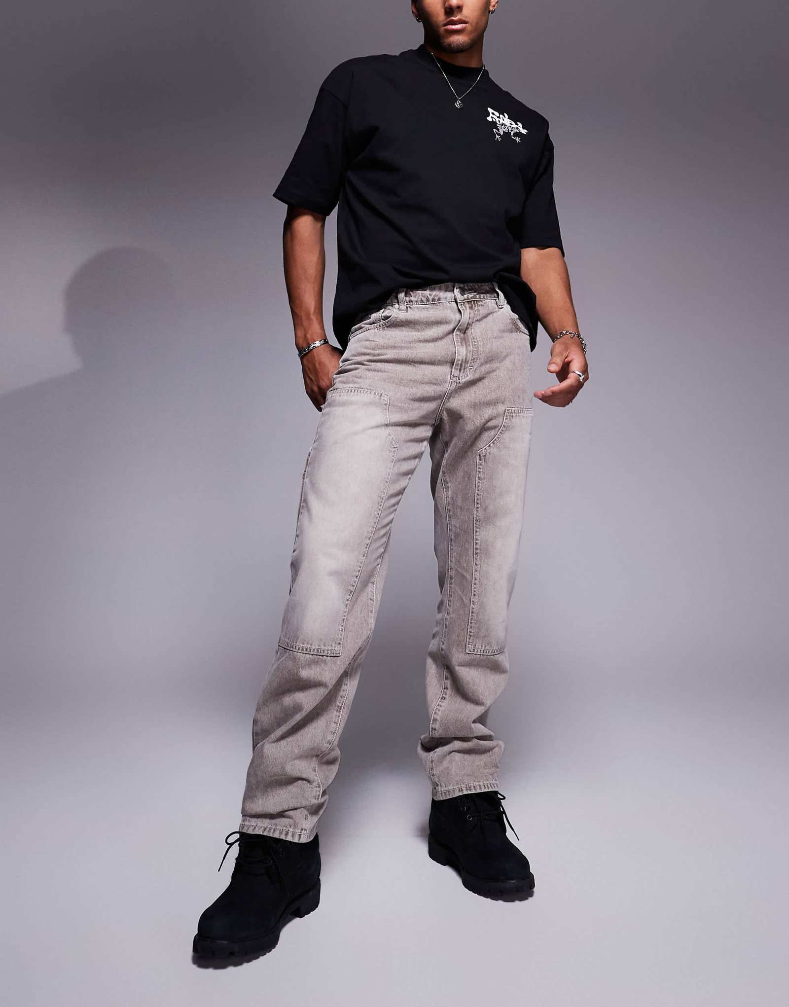 Выцветшие джинсы из магазина carpenter после стирки в камне