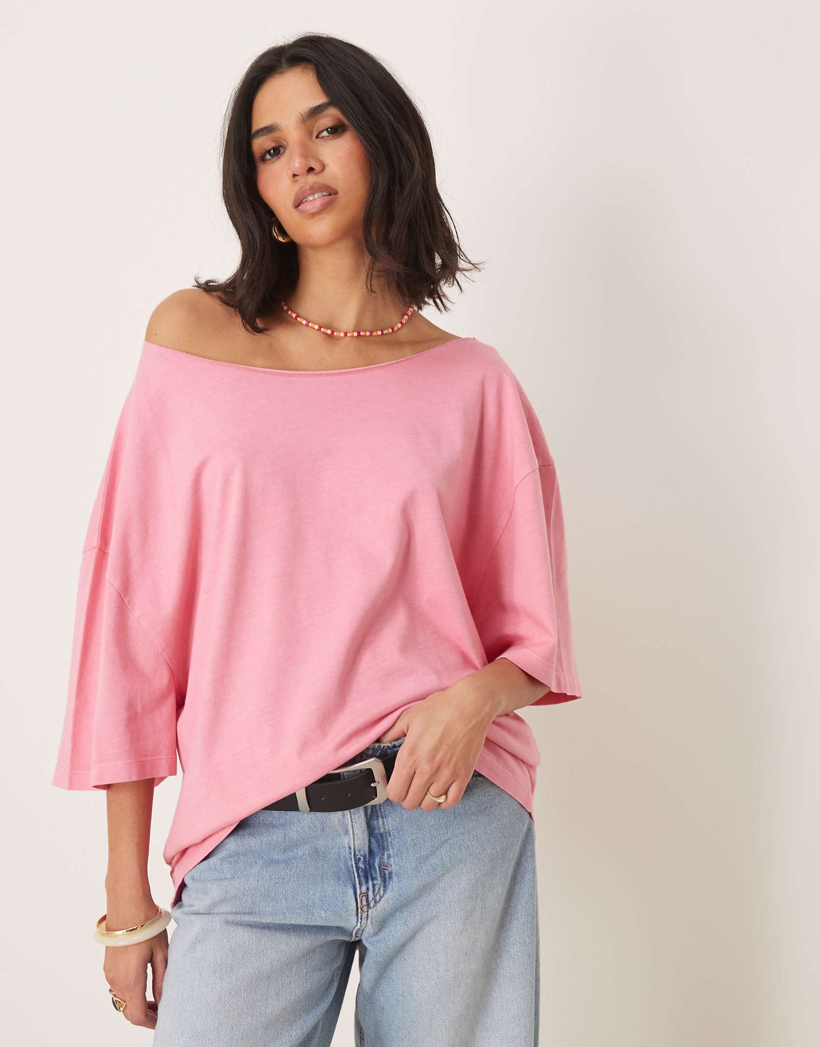 Объемная футболка ASOS DESIGN с открытыми плечами окрашенная в нежно-розовый цвет 3490₽