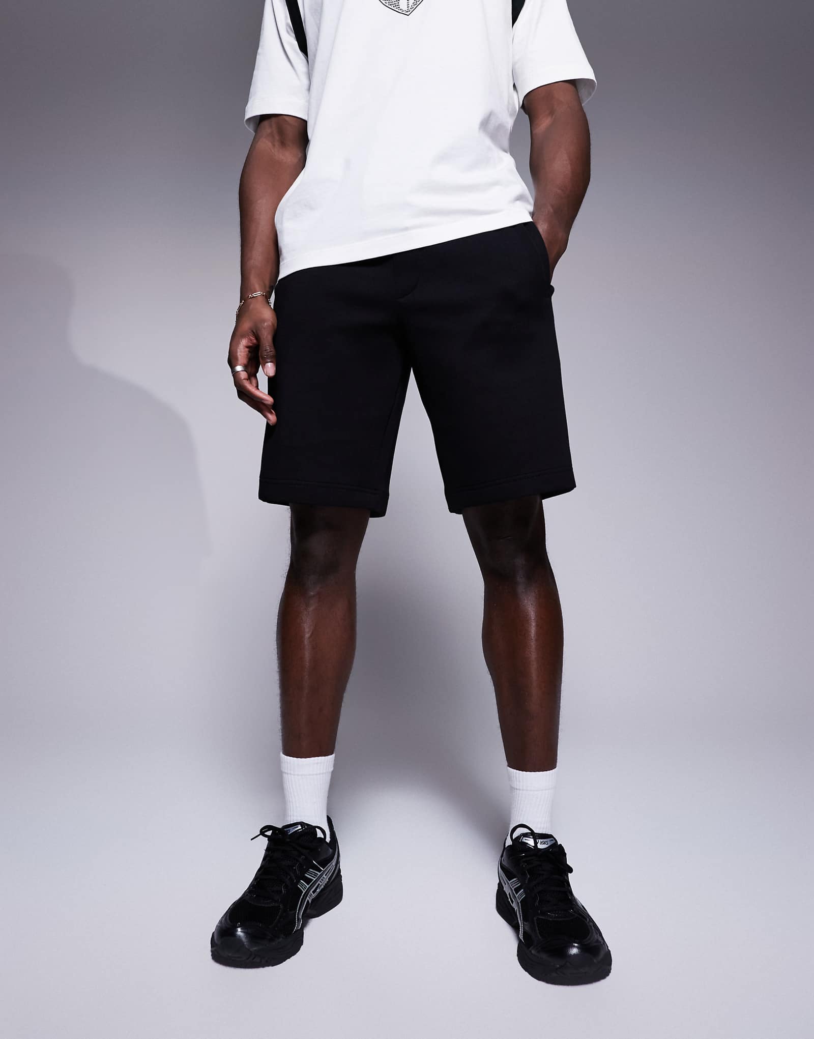 Спортивные шорты с логотипом Armani Exchange черного цвета 11390₽