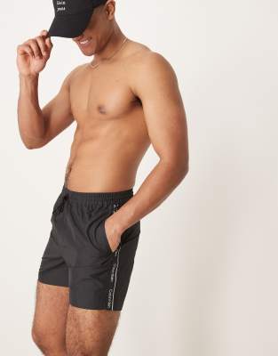 Плавательные шорты на завязках с логотипом Calvin Klein черного цвета
