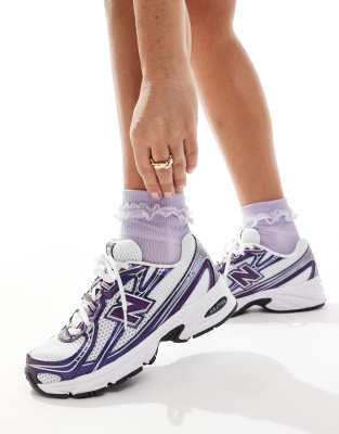 Женские кроссовки New Balance 740 белого и фиолетового цветов