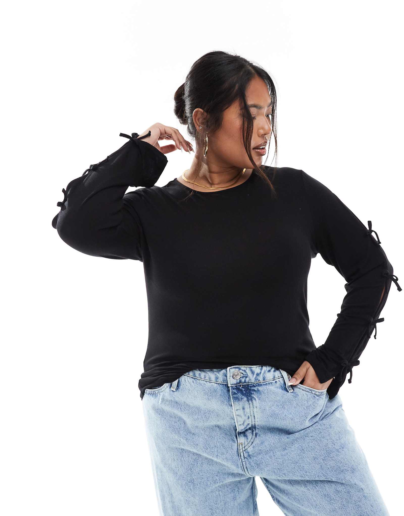 Черный топ с длинным рукавом и изогнутым бантом в единственном экземпляре