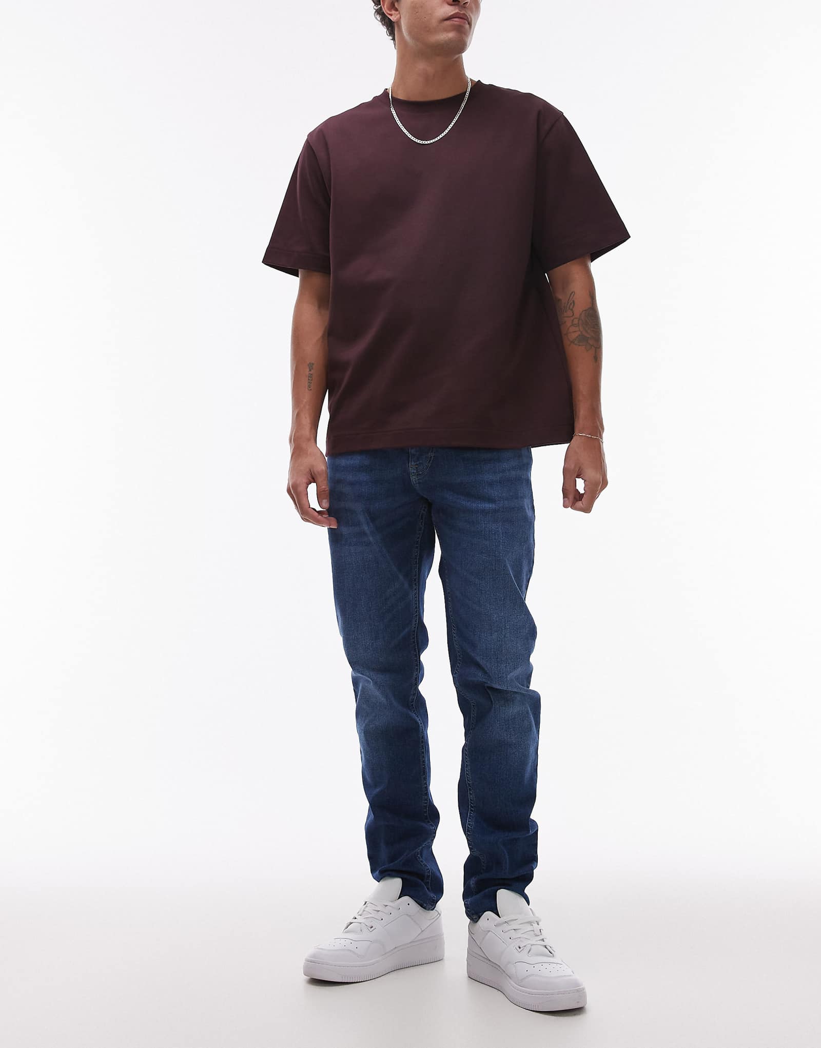 Узкие зауженные джинсы Tommy Jeans Austin темно-синего цвета 17390₽