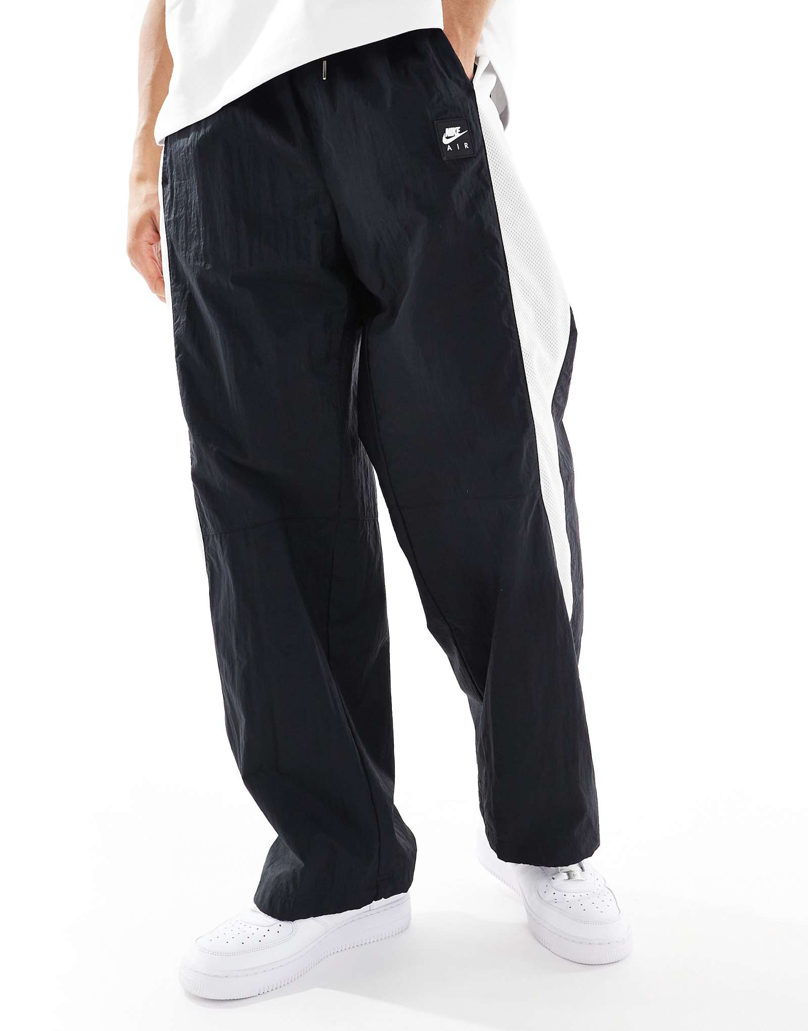 Брюки Nike Air с ткаными вставками черного и белого цветов 19390₽