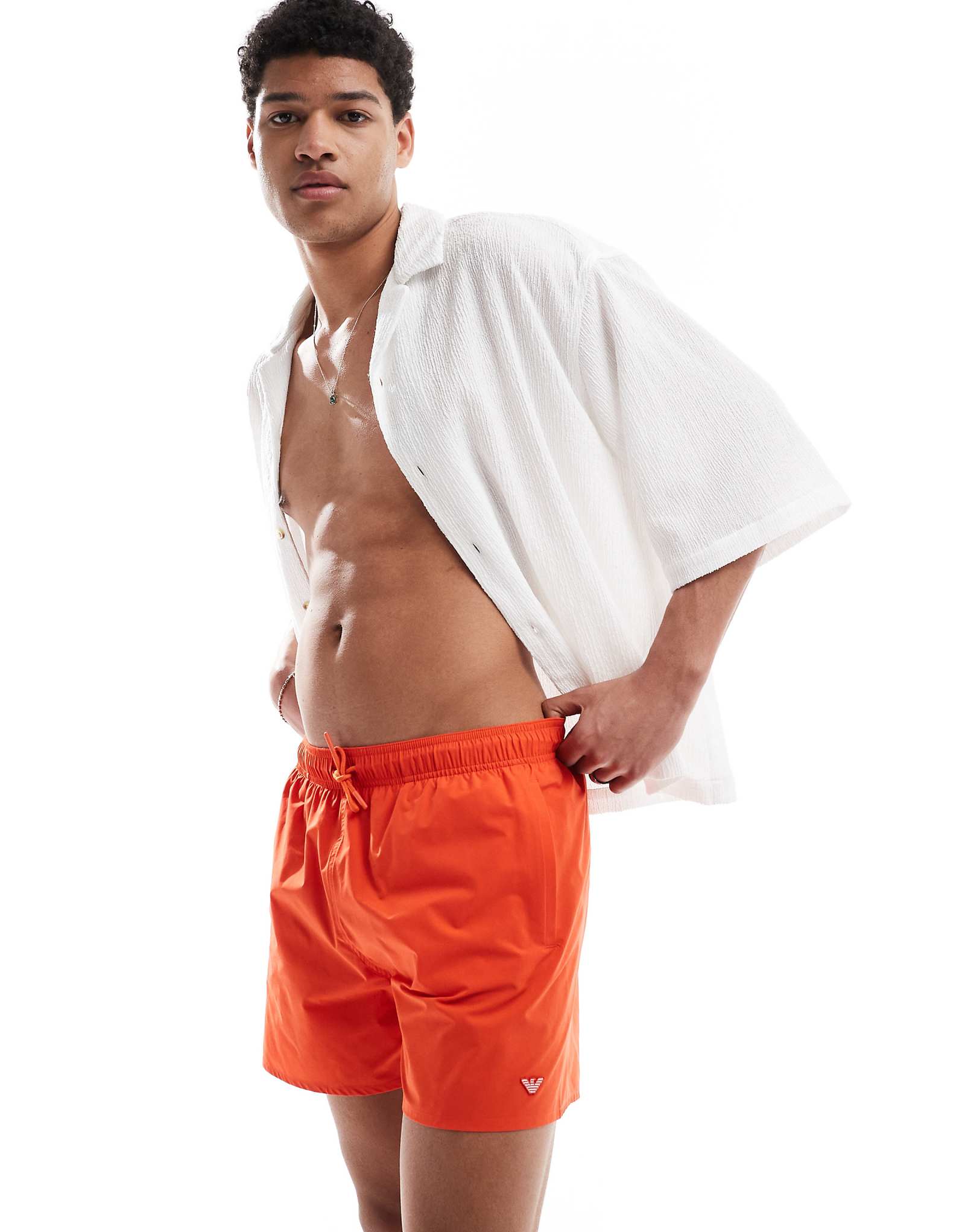 Черные плавательные шорты с логотипом Emporio Armani 10890₽