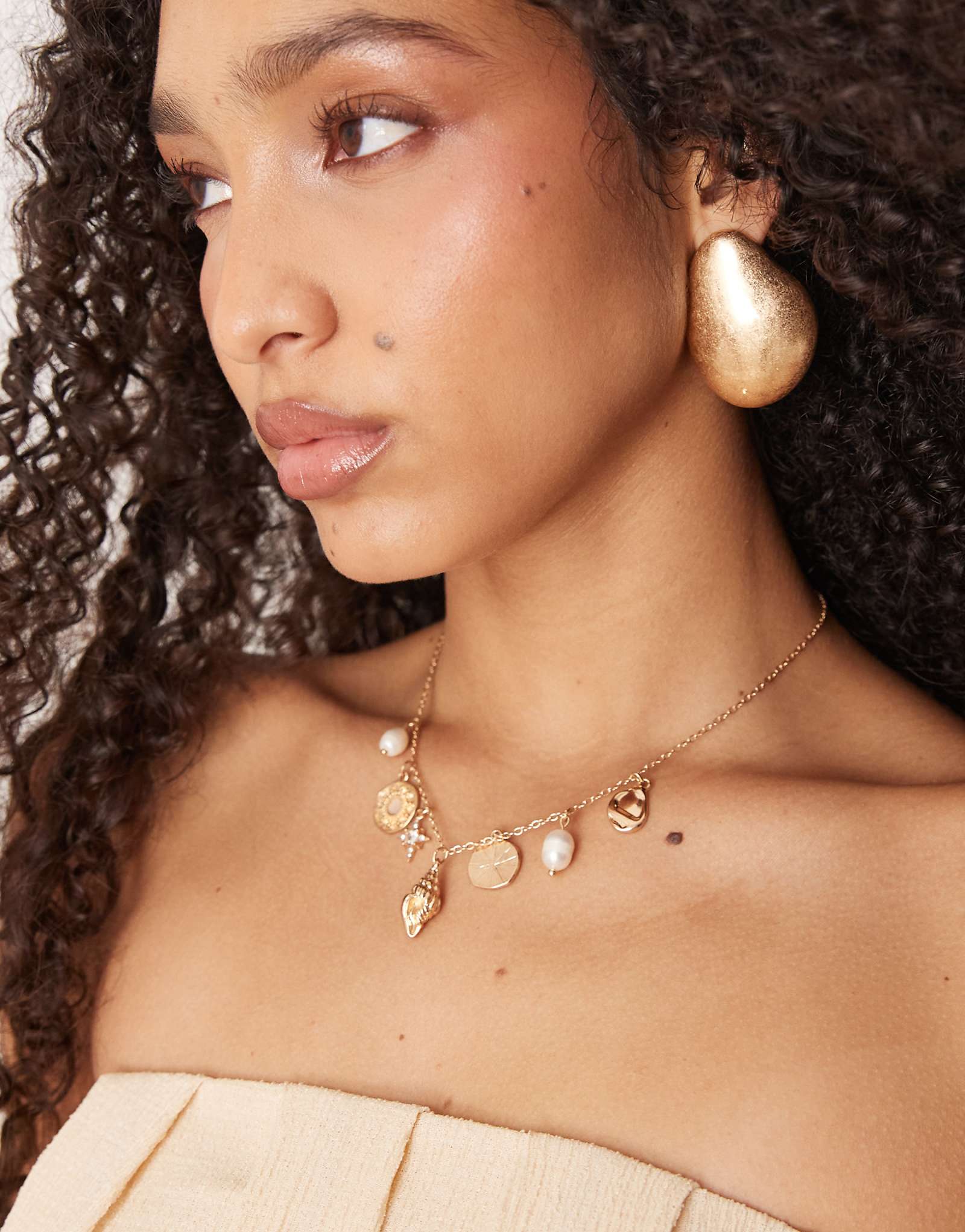 Дополните аксессуарами ожерелье из золотых ракушек-талисманов treasure charm 3890₽