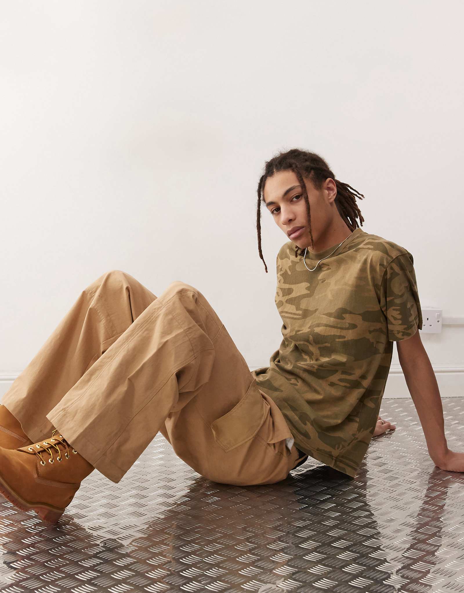 Камуфляжная футболка оверсайз от Pacsun зеленого цвета