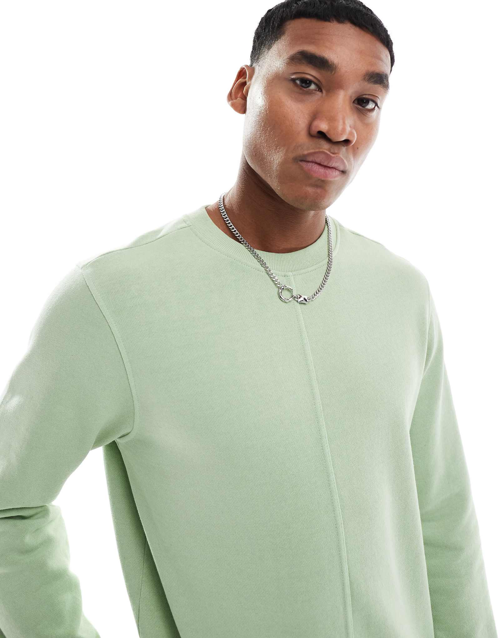 Еще одно влияние кислотной стирки на шов толстовки зеленого цвета 5690₽