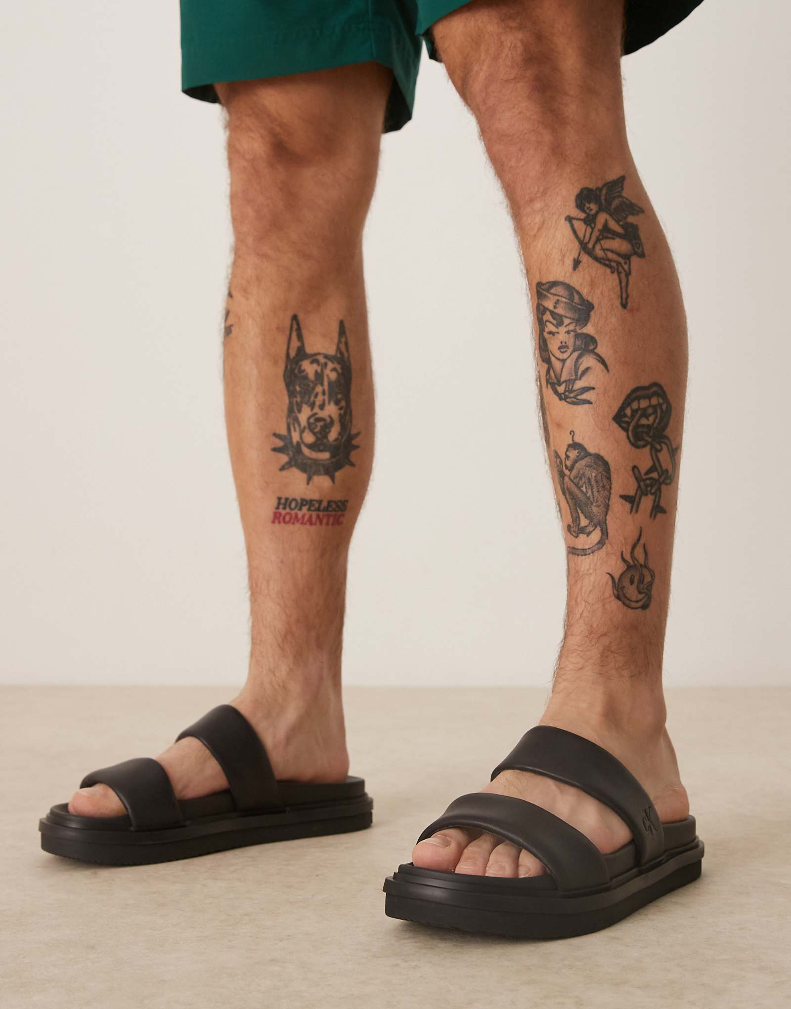 Черные кожаные сандалии-горки Calvin Klein Jeans с двойным ремешком 22190₽