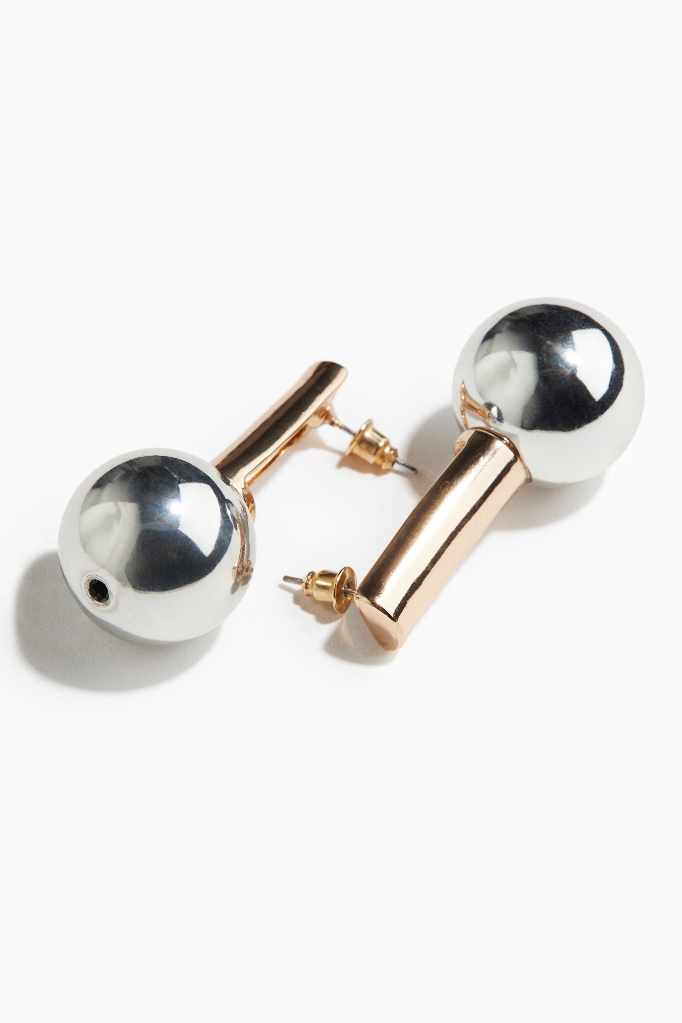 Двухцветные серьги H-M 1990₽