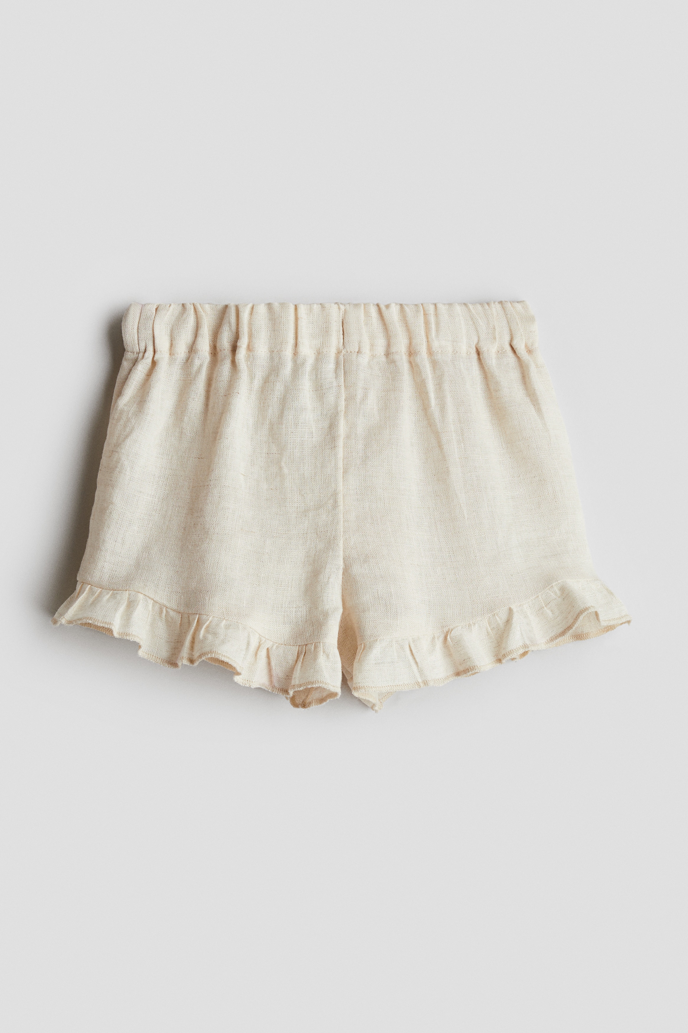 Льняные шорты с оборками от H&M
