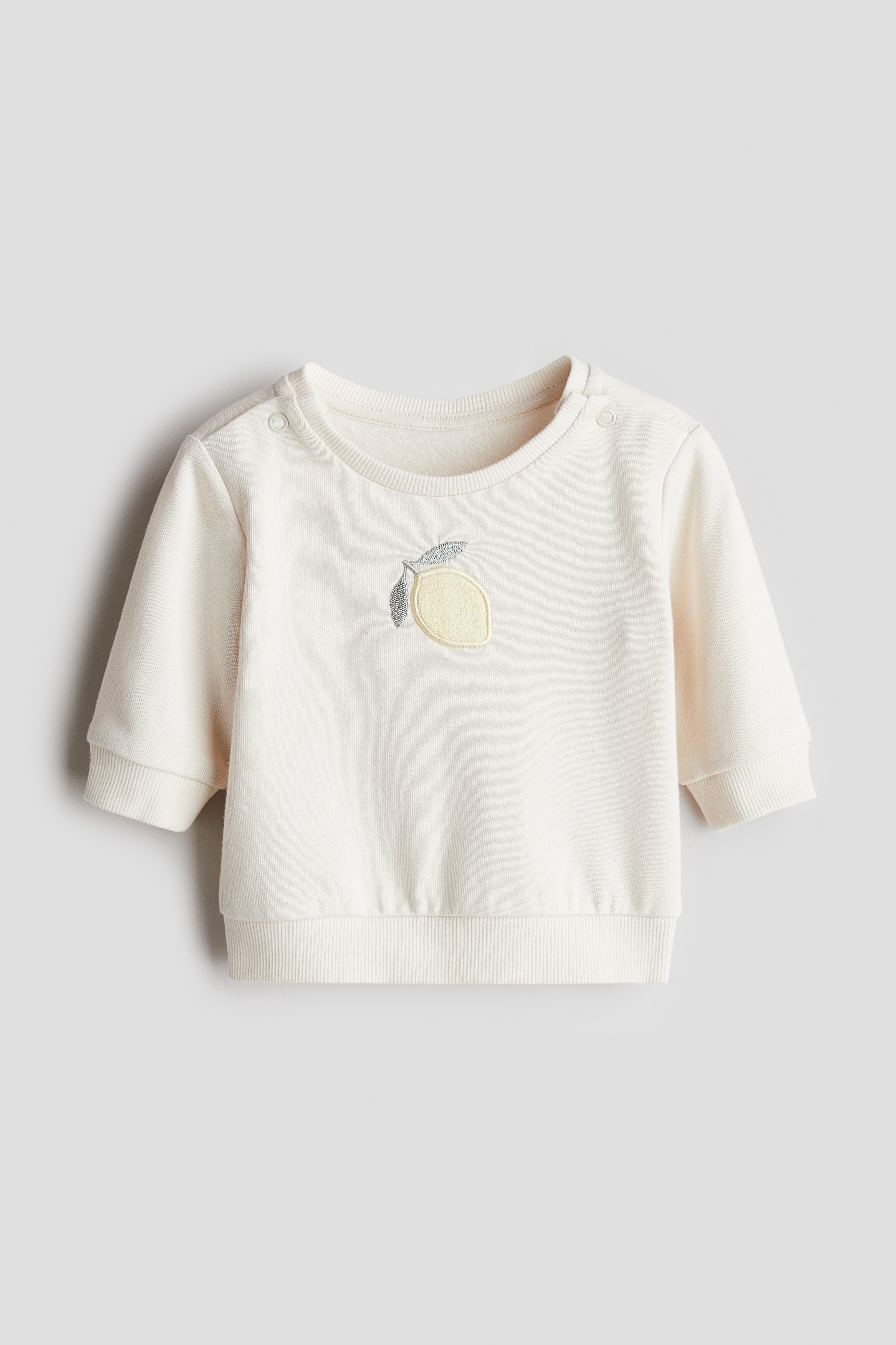 Толстовка H&M c аппликацией