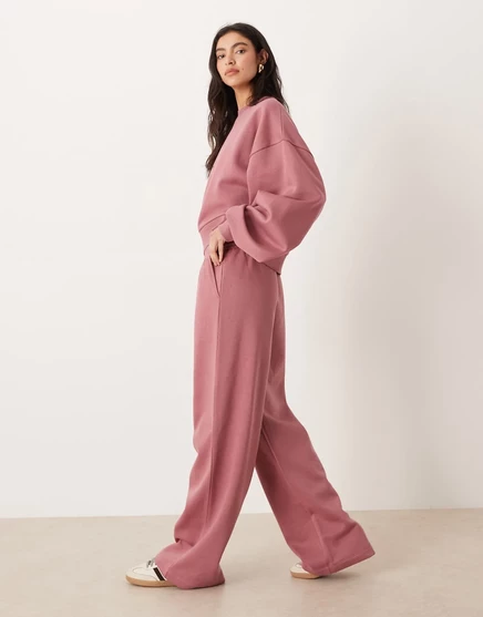 Дизайнерские спортивные брюки ASOS с широкими штанинами и кисточкой на спине розового цвета rose pink