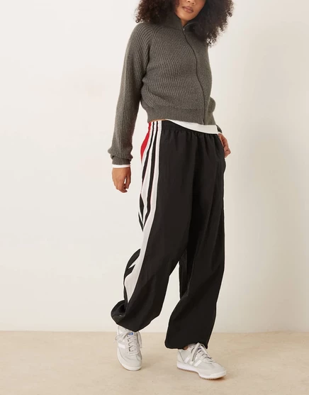 Женские брюки adidas Originals Santigao широкого кроя с красной вставкой, черные
