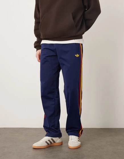 спортивные брюки adidas Originals firebird темно-синего и желтого цветов navy