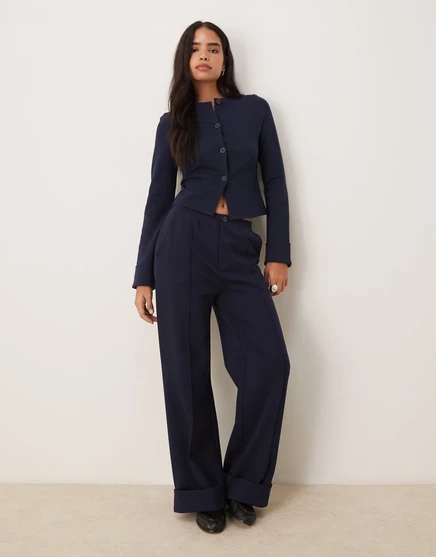 Спортивные брюки ASOS DESIGN interlock с отложным воротником темно-синего цвета navy