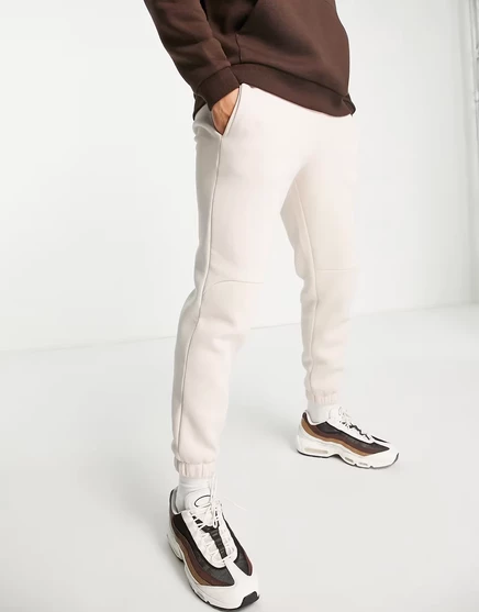 Зауженные спортивные брюки ASOS DESIGN бежевого цвета moonbeam
