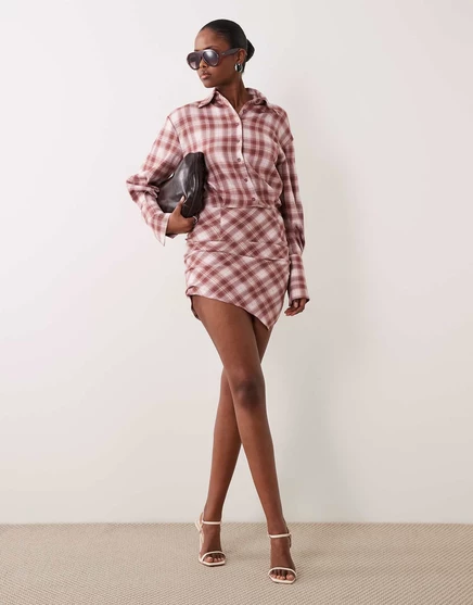 Noughts &amp Kisses button up shirt asymmetric hem mini dress in pink check pink