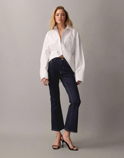 ДИЗАЙНЕРСКИЕ укороченные джинсы-клеш от ASOS в полоскании rinse