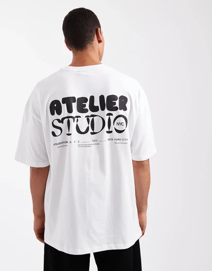ДИЗАЙНЕРСКАЯ футболка оверсайз от ASOS с рисунком atelier studio белого цвета white