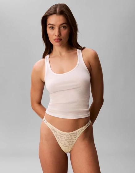 Кружевные стринги Calvin Klein Icon с окантовкой в светло-желтом цвете