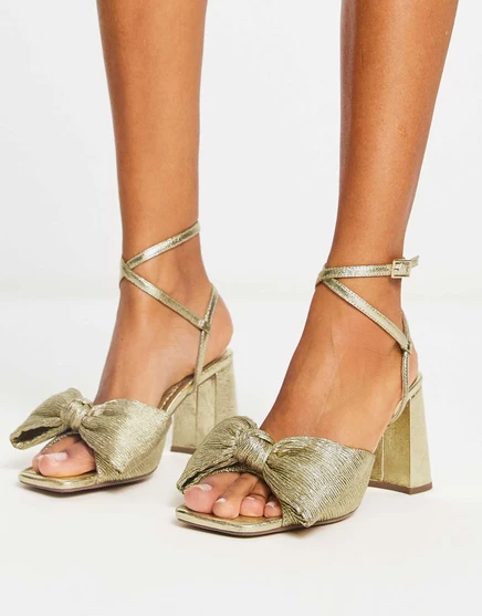 Женские босоножки ASOS DESIGN Hitched на среднем каблуке с бантом, золотистые