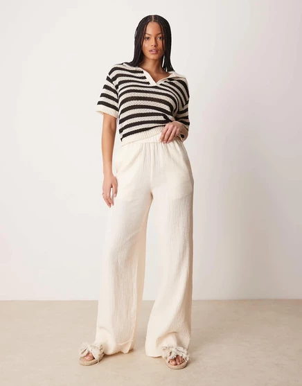 ДИЗАЙНЕРСКИЕ высокие брюки из марли ASOS DESIGN с необработанным краем, покрытые пахтой buttermilk
