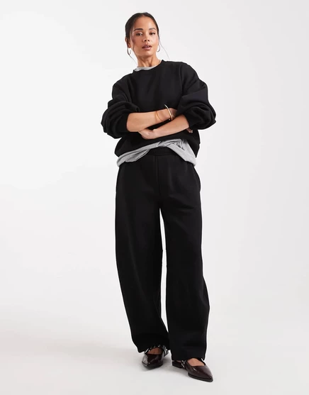Спортивные брюки ASOS DESIGN с закругленными штанинами черного цвета black