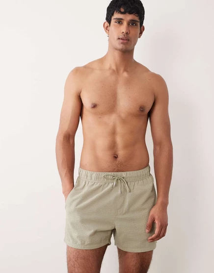 ДИЗАЙНЕРСКИЕ короткие плавательные шорты ASOS в полоску цвета шалфея sage green