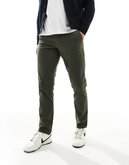 Темно-хаки узкие брюки чиносы ASOS DESIGN khaki