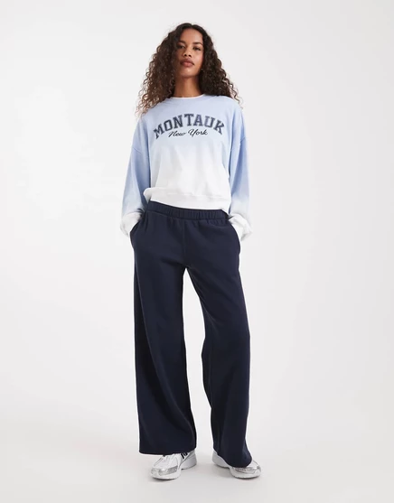 Широкие спортивные брюки Hollister темно-синего цвета с карманом в виде сердечка 