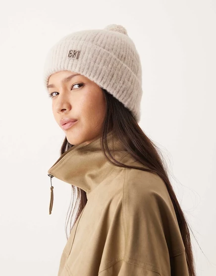 Шапочка с помпоном от Calvin Klein серого цвета brown