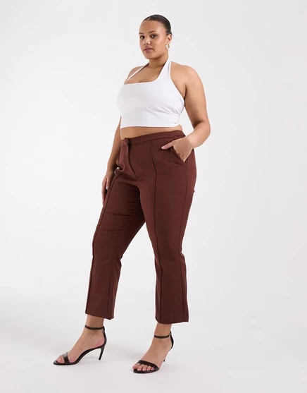 Брюки-клеш ASOS DESIGN Curve коричневого цвета с ромовым изюмом, сшитые по индивидуальному заказу