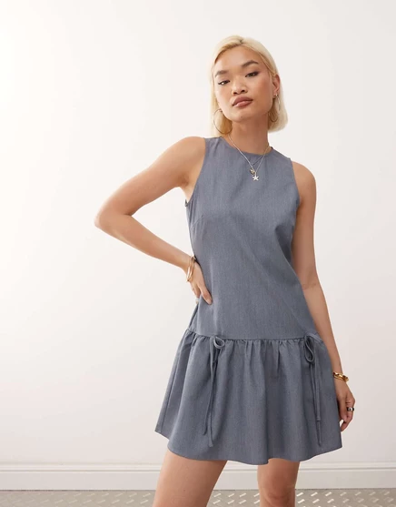 Серое платье с баской без рукавов Noisy May с заниженной талией и бантиками light gray melange