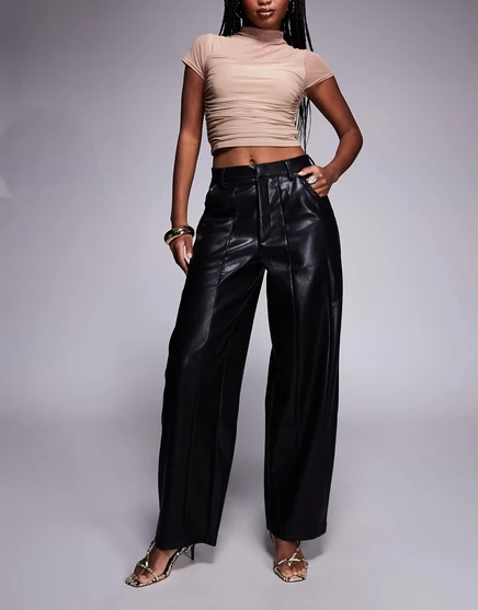 Черные брюки-бочкообразные брюки ASOS DESIGN, выполненные в кожаном стиле с детализацией швов black