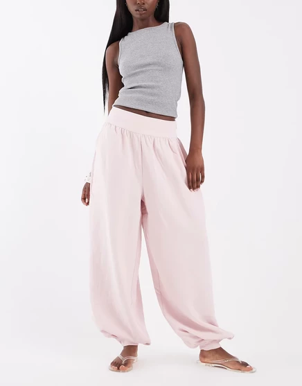 Брюки-баллоны ASOS DESIGN с манжетами по низу, сшитые на заказ, розового цвета pink