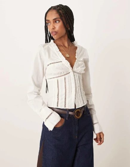 Корсетный топ Free People frankie с длинным рукавом цвета слоновой кости  clean ivory