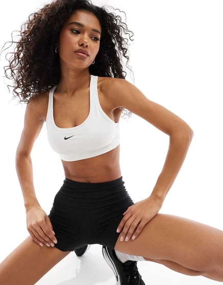 Спортивный бюстгальтер Nike Training Swoosh light support белого цвета white