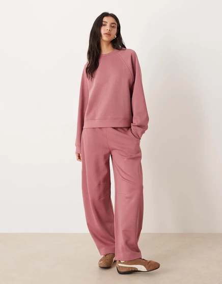 Дизайнерские спортивные брюки ASOS с бочкообразными штанинами и кисточкой на спине розового цвета rose pink