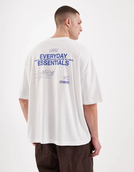 ДИЗАЙНЕРСКАЯ футболка оверсайз от ASOS с надписью everyday essentials белого цвета white