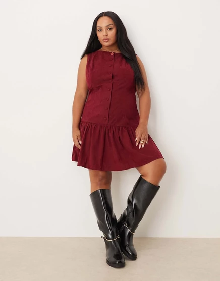 Мини-платье ASOS DESIGN Curve из вельвета с вырезом лодочкой и заниженной талией на пуговицах темно-вишневого цвета deep cherry red