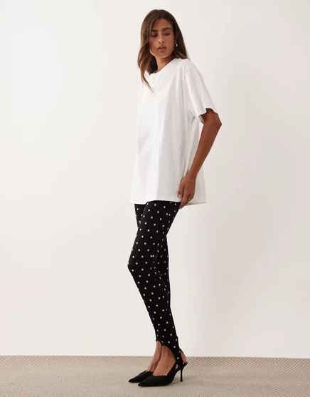Леггинсы ASOS DESIGN interlock stirrup с черным принтом в горошек
