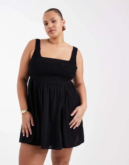 Пляжный мини-сарафан из текстурированного хлопка с гофрировкой от ASOS DESIGN Curve Selina черного цвета