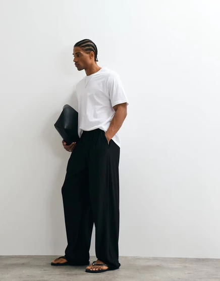 Мужские спортивные штаны ASOS Design широкого кроя с двойной складкой и карманами, черные