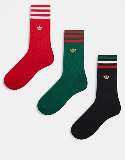 носки adidas Originals Trefoil 2.0, состоящие из трех комплектов, выполнены в черном, красном и зеленом цветах.