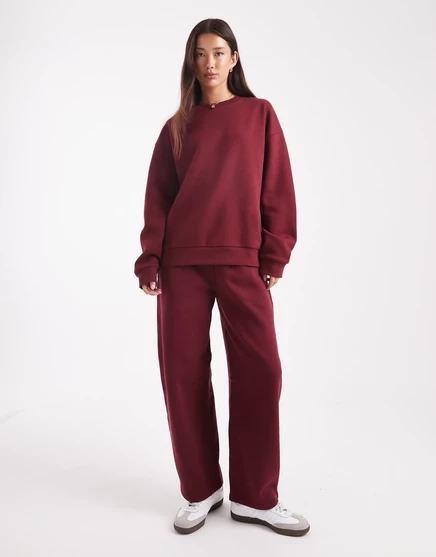 Спортивные брюки ASOS DESIGN brushback с бочкообразными штанинами бордового цвета burgundy